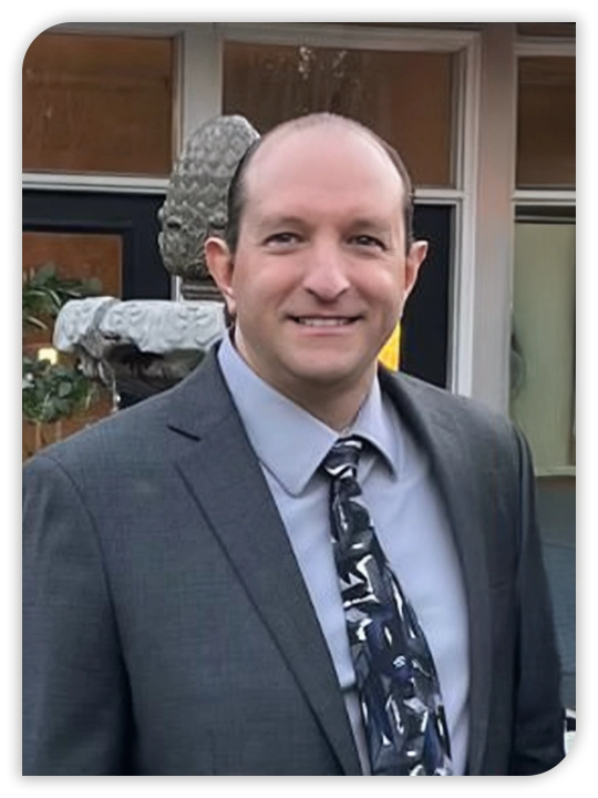 Acupuncturist Scott Nause Smiling In Grey Suit